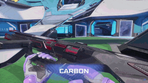 a person is holding a gun with the word carbon on the bottom