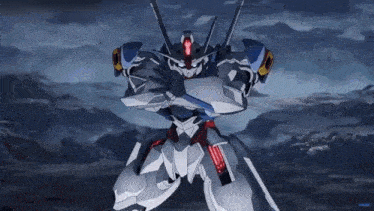 a robot is standing in the middle of a field holding a sword and shield .