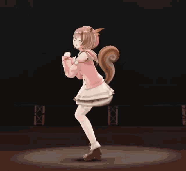 a girl with a squirrel tail is dancing on stage