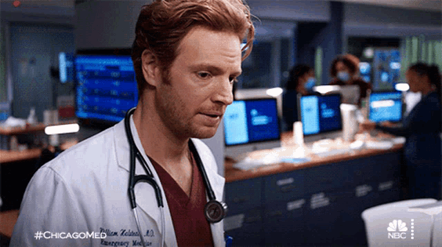 a man in a lab coat with a stethoscope around his neck has the hashtag #chicagomed on the bottom