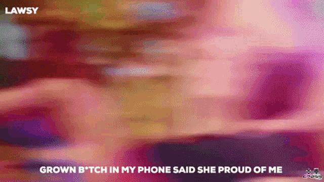 a blurry picture of a person with the words `` grown b tch in my phone said she proud of me '' .