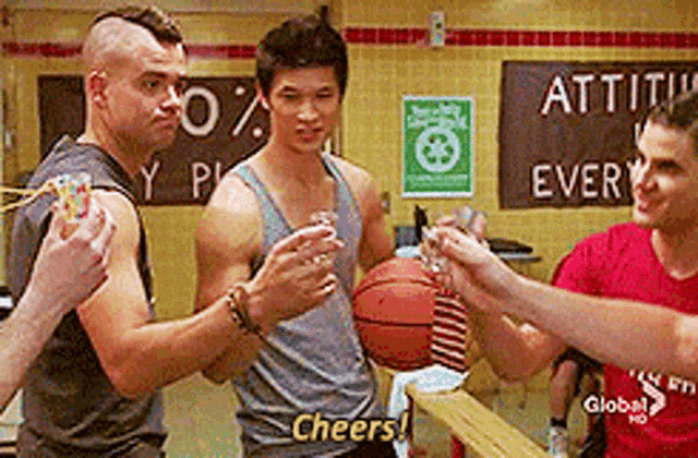 a group of men are standing next to each other with a basketball and a sign that says attitude every .