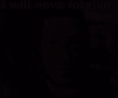 a man with a beard is looking at the camera and says i will neva forgive you .