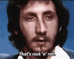 a man with a beard says " that 's rock 'n ' roll "