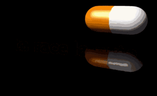 an orange and white capsule with a yellow center on a black background