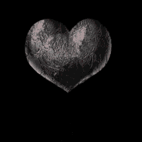 a broken heart with a red heart in it