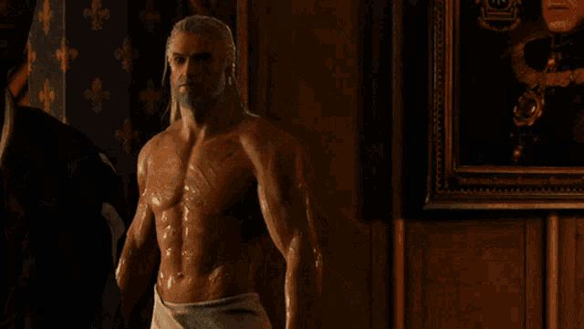 a shirtless man with a towel around his waist is asking the question " the what now "