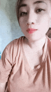 a close up of a woman 's face and neck