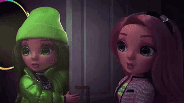 two dolls are standing next to each other in a dark room .