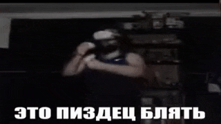 a woman wearing a virtual reality headset is talking to a man in a room .