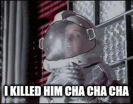 a man in an astronaut 's helmet is standing in front of a window .