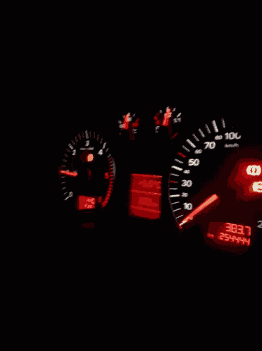 a close up of a car 's dashboard with the numbers 38.5 and 26 on it