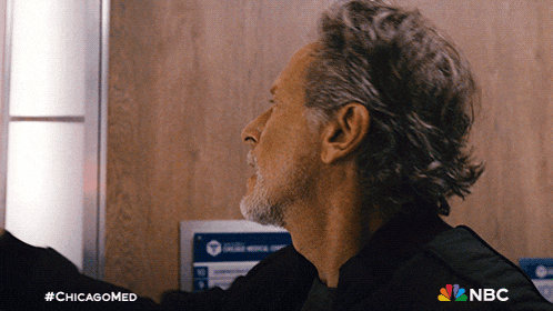 a close up of a man 's face with the hashtag #chicagomed on the bottom