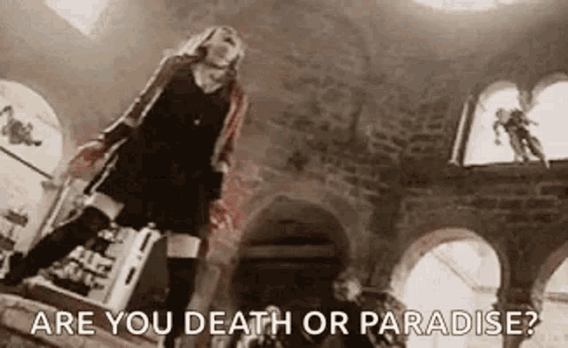 a woman in a black dress is standing on a set of stairs and says `` are you death or paradise '' .