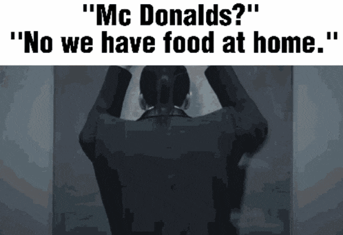 a man with his hands on his head is behind a sign that says " mc donalds no we have food at home "