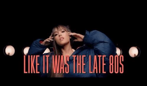 ariana grande is wearing a blue jacket with the words like it was the late 80s above her