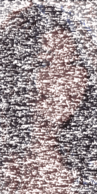 a close up of a gray and white striped fabric