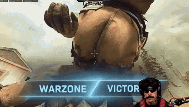 a man playing a video game with the words warzone victor