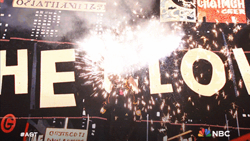 a fireworks display with the word hello in white