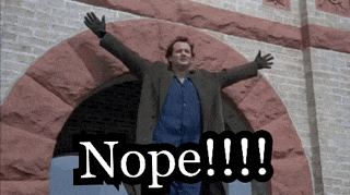 a man is standing in front of a brick building with his arms outstretched and the words nope !!! above him .