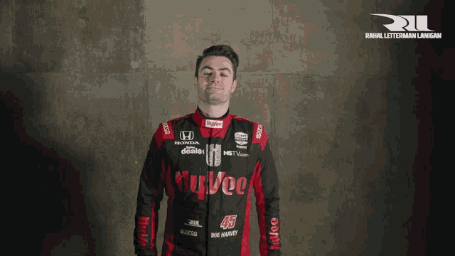 a man is wearing a black and red uniform with the number 45 on the front