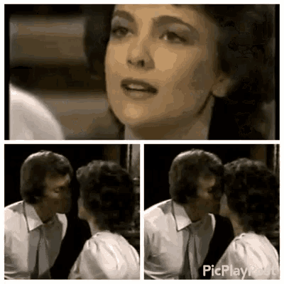 a man and a woman are kissing in a room .
