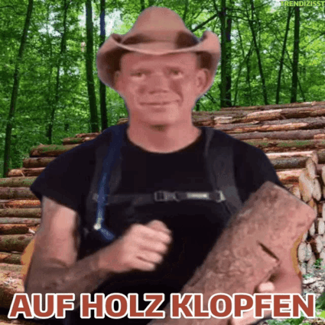 a man in a cowboy hat is holding a log in front of a pile of logs with the words auf holz klopfen above him