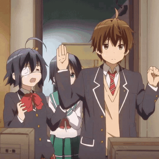 a group of anime characters standing next to each other with one giving a high five
