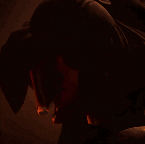 a close up of a person 's face with two glowing crosses