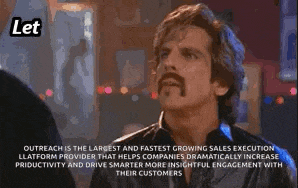 a man with a mustache is making a funny face and saying let me hit you .