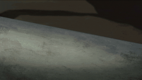 a close up of a person 's hands with a few scratches on them