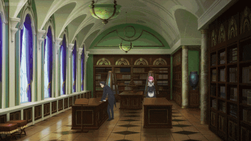 a man in a tuxedo stands in a library with a maid
