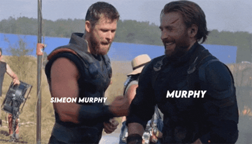 two men named simeon murphy and chris evans are shaking hands