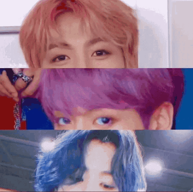 a close up of a person 's face with purple hair