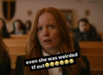 a woman with long red hair is sitting in a church with a caption that says `` even she was weirded tf out ''