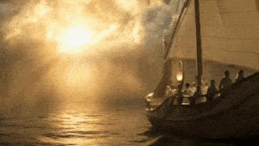 a group of people are on a boat in the ocean
