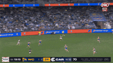 a soccer game is being played on fox sports channel