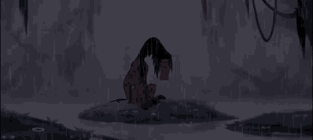a cartoon character is sitting in the rain .