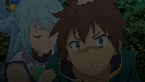 a man and a woman are standing next to each other