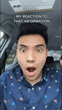 a man in a car with his mouth open and the words my reaction to that information on the bottom