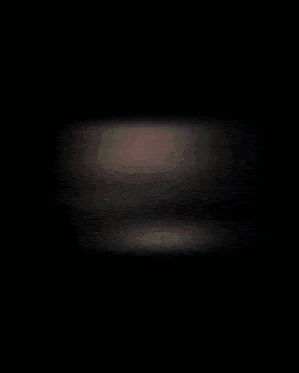 a blurry picture of a person 's torso and legs