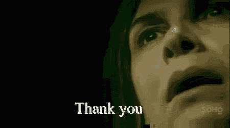 a close up of a woman 's face with the words thank you written below it