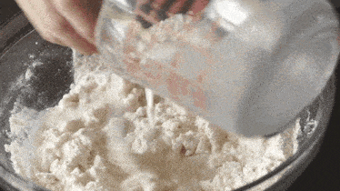 Mixing The Flour Two Plaid Aprons GIF - Mixing The Flour Two Plaid Aprons Combining The Flour GIFs