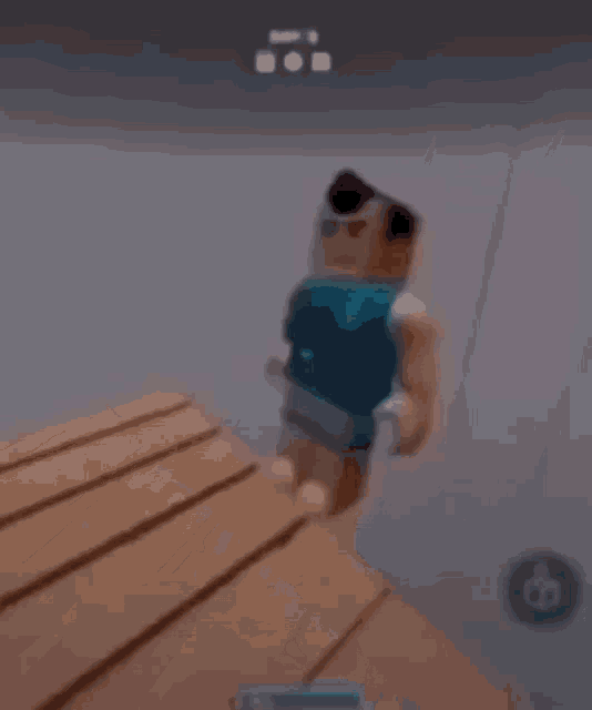 a cartoon character is hanging from a rope .