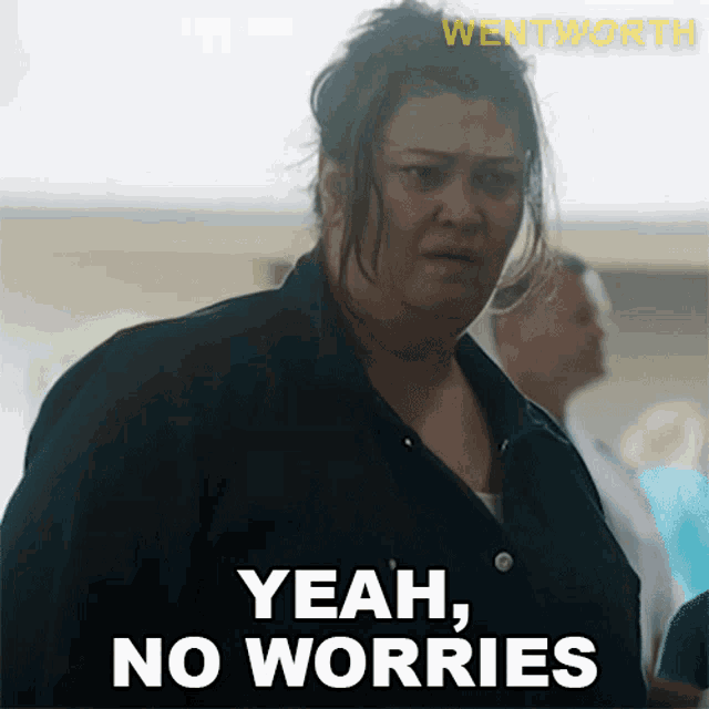 a woman says " yeah no worries " while wearing a black shirt