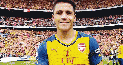 a soccer player wearing a yellow fly jersey