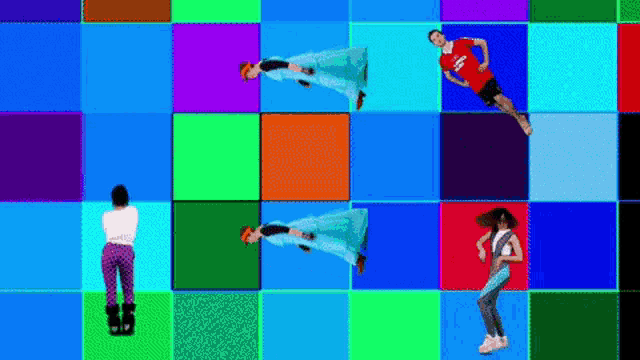 a man in a red adidas shirt stands on a colorful tile floor