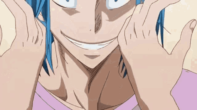 a man with blue hair is making a funny face with his hands .