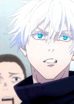 a man with white hair and blue eyes is standing next to another man in a black jacket .