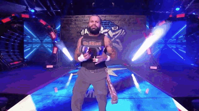 a wrestler with a black tank top that says o'neil